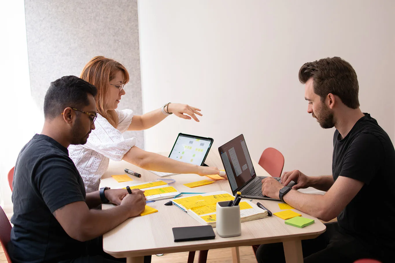 ProdActive designers reviewing app screens together